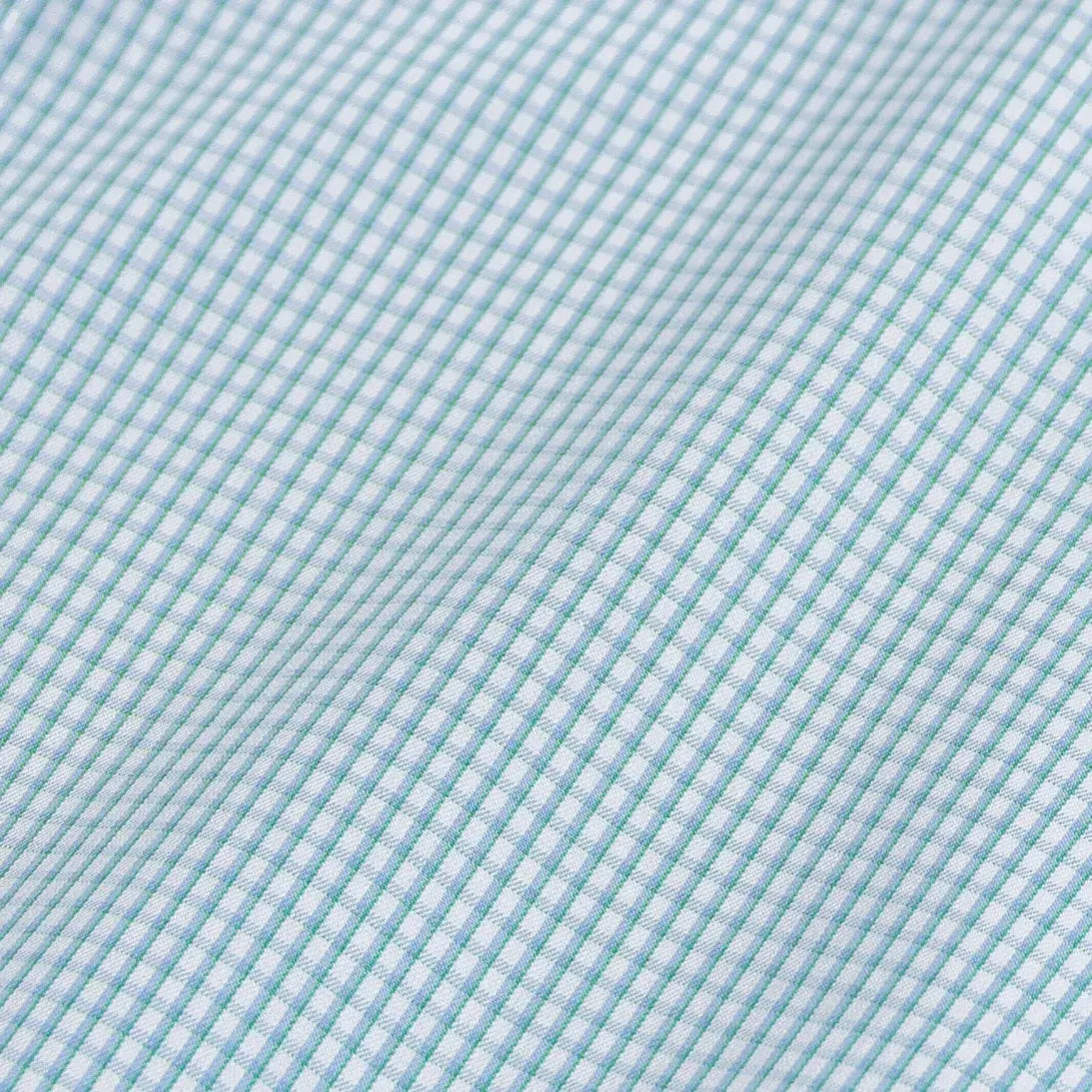 Kent micro-twill fabric close-up - green micro check pattern texture