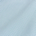 Kent micro-twill fabric close-up - green micro check pattern texture