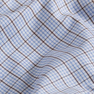 Kent micro-twill fabric close-up - brown windowpane check pattern texture