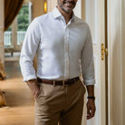 Man wearing blue Journey Flex performance dress shirt - wrinkle-resistant stretch fabric