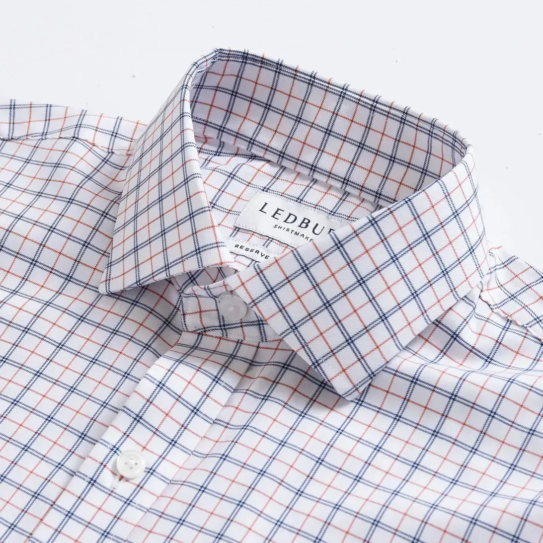 Custom dress shirt collar detail - Journey Flex orange windowpane performance fabric construction