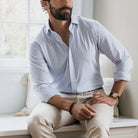 Man wearing light blue Journey Flex performance tattersall dress shirt - wrinkle-resistant stretch fabric
