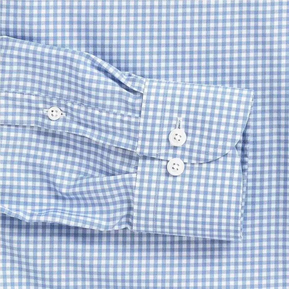 Blue gingham performance dress shirt cuff and sleeve - Journey Flex stretch fabric tailoring