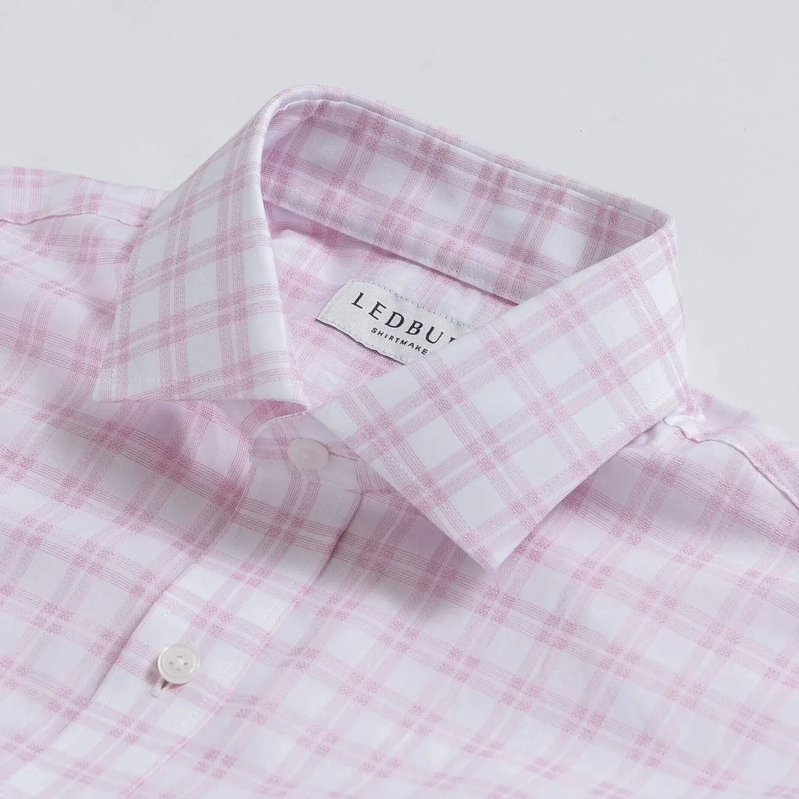 Pink plaid dress shirt collar detail - lightweight cotton construction