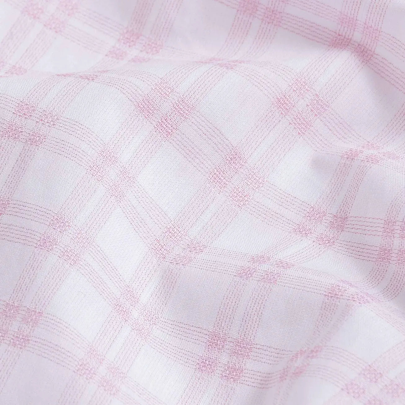 Pink Ellis plaid fabric close-up - mixed open basket weave texture