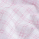 Pink Ellis plaid fabric close-up - mixed open basket weave texture