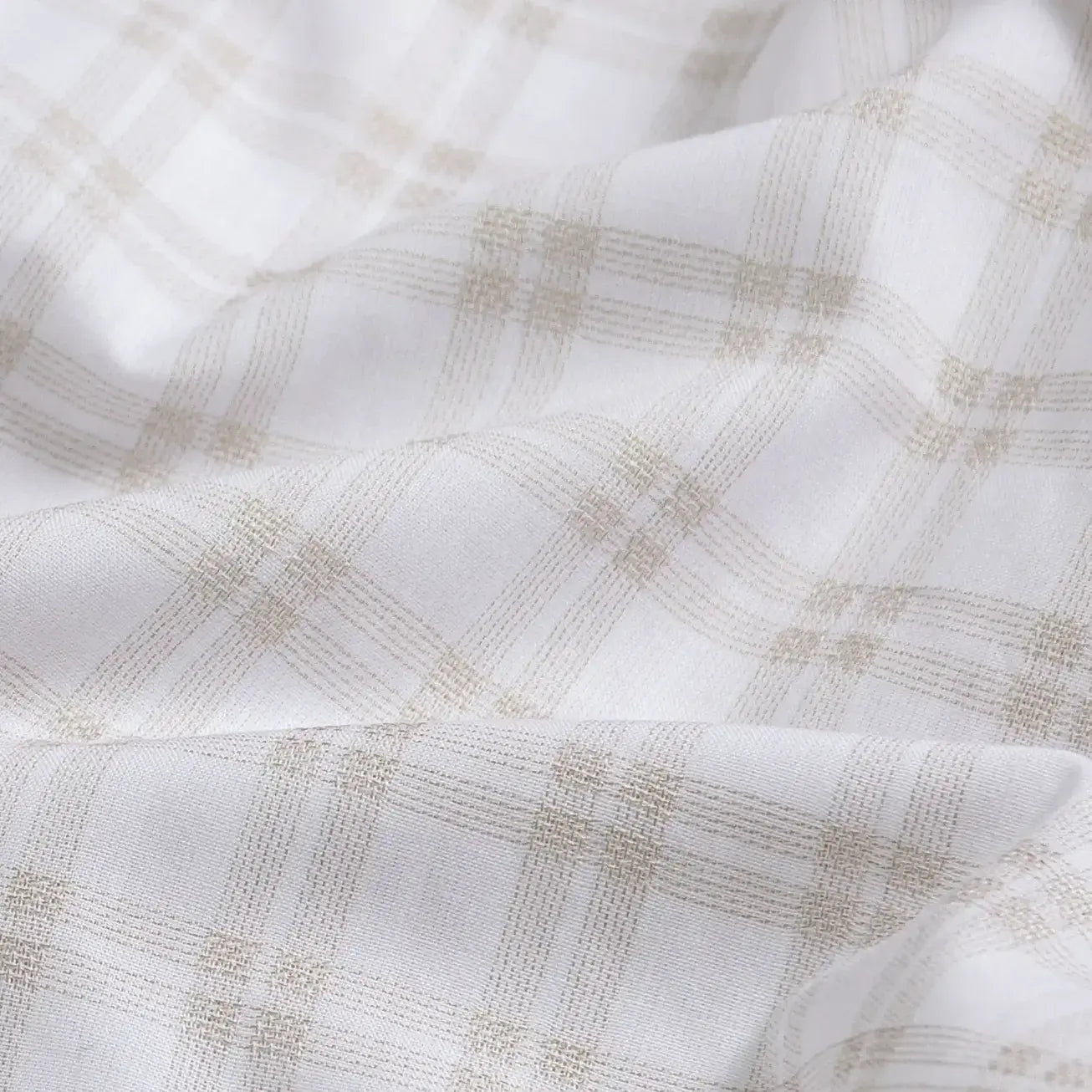 Tan Ellis plaid fabric close-up - mixed open basket weave texture