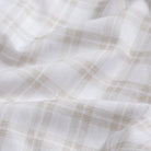 Tan Ellis plaid fabric close-up - mixed open basket weave texture