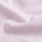 Close-up of light pink fabric texture