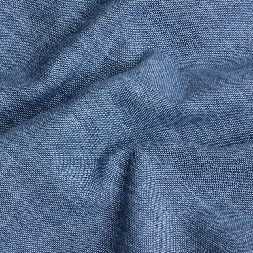 Medium blue Sandoval oxford chambray shirt fabric texture closeup - Ledbury slub cotton weave detail