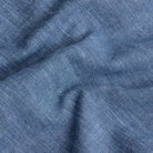 Medium blue Sandoval oxford chambray shirt fabric texture closeup - Ledbury slub cotton weave detail