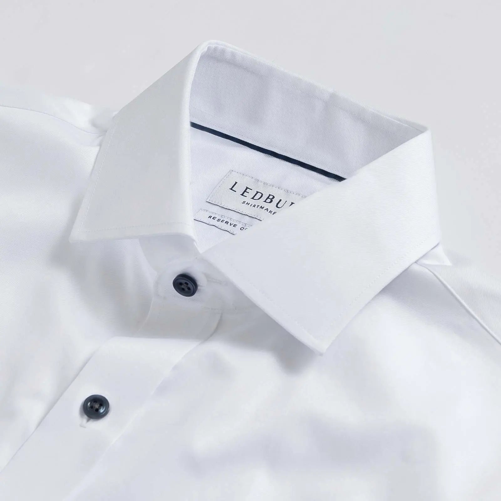 White dress shirt collar with navy button detail - fine twill shirt