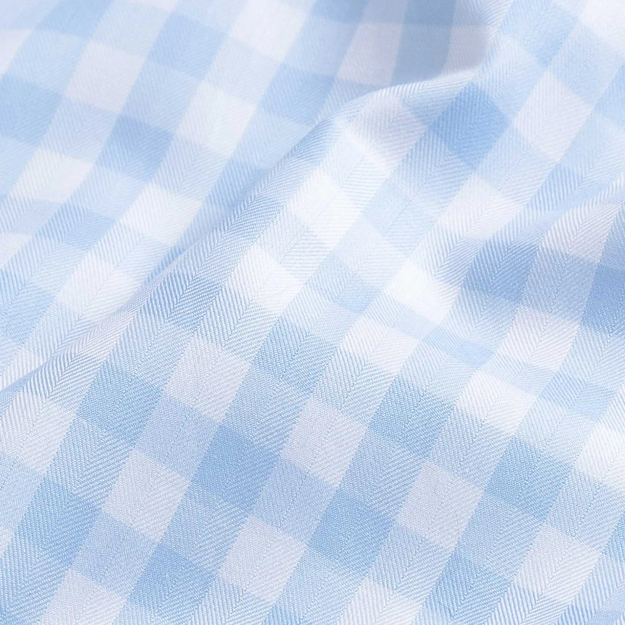 Gingham check fine twill fabric close-up - light blue classic pattern texture