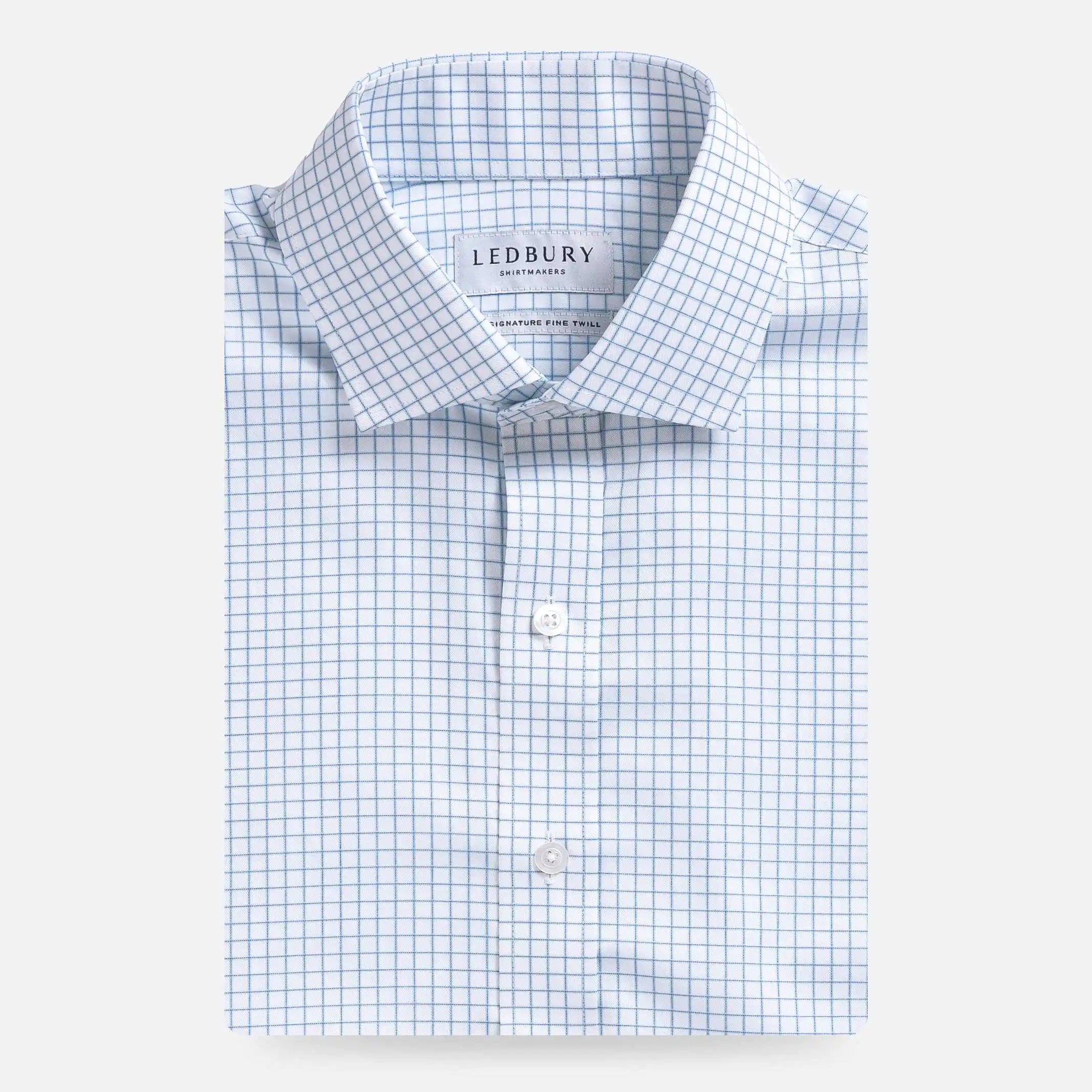 Light blue grid check dress shirt flat lay - subtle pattern fine twill