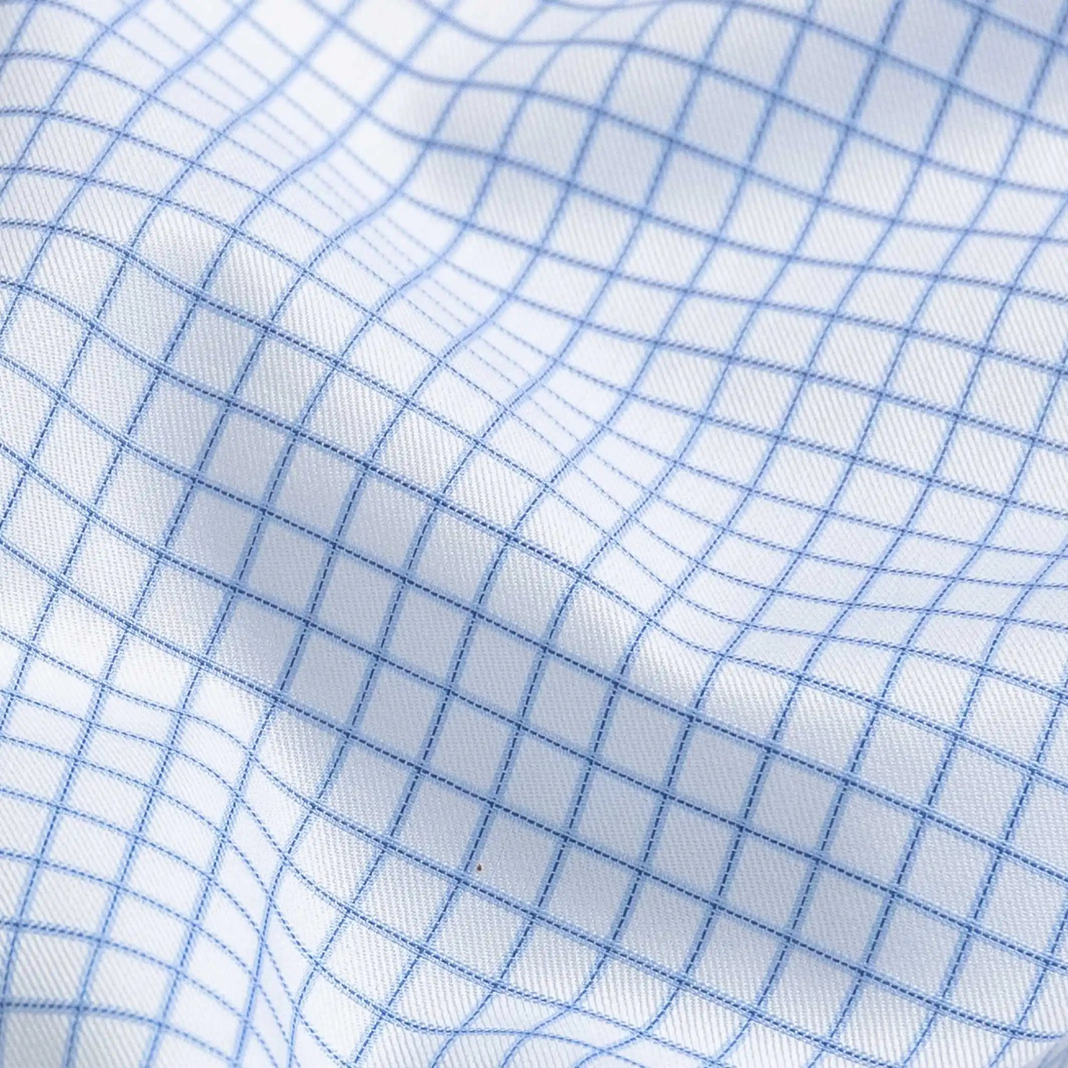 Grid check fine twill fabric close-up - light blue subtle pattern texture