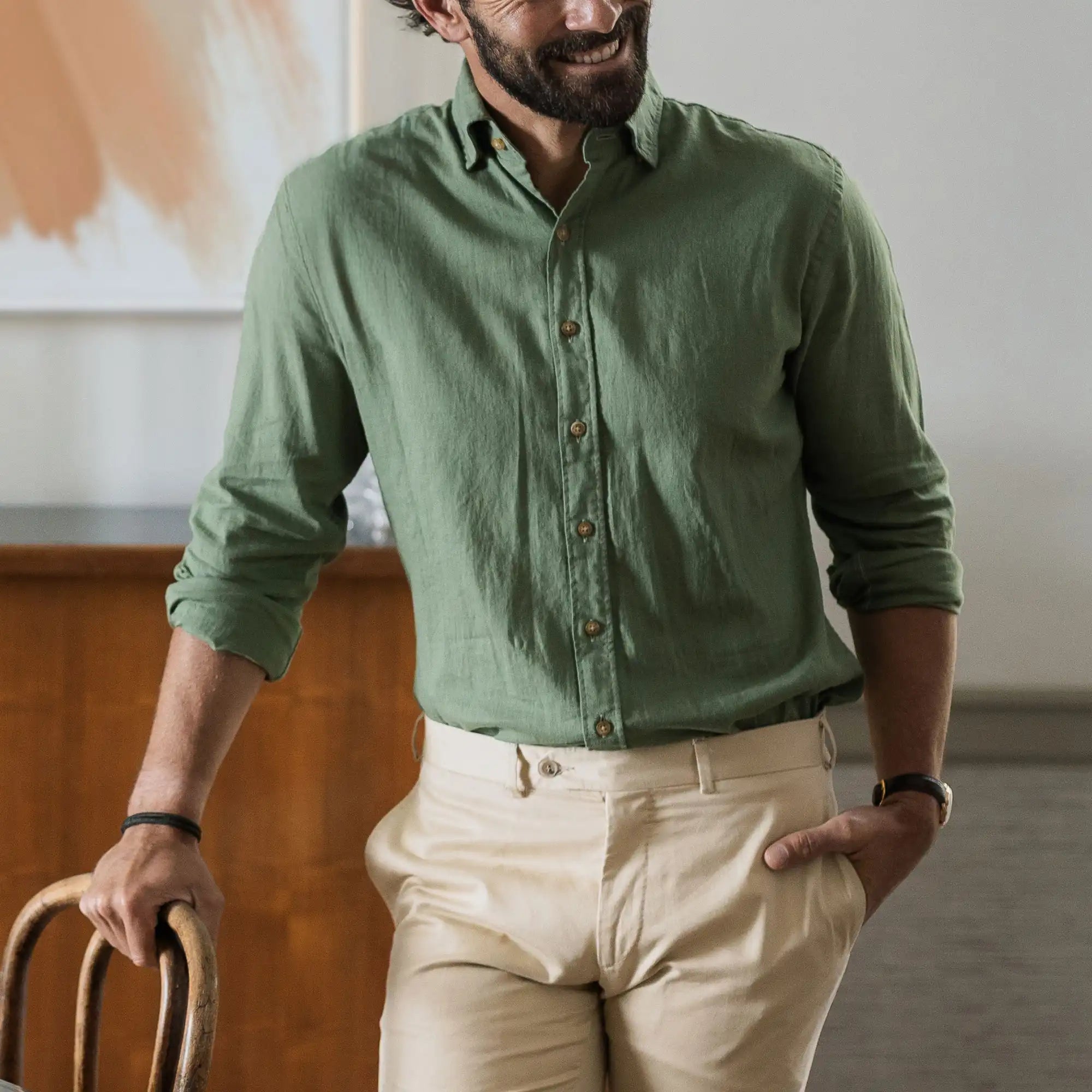 Man wearing verde green Barlotta linen shirt lifestyle - Ledbury custom fit linen