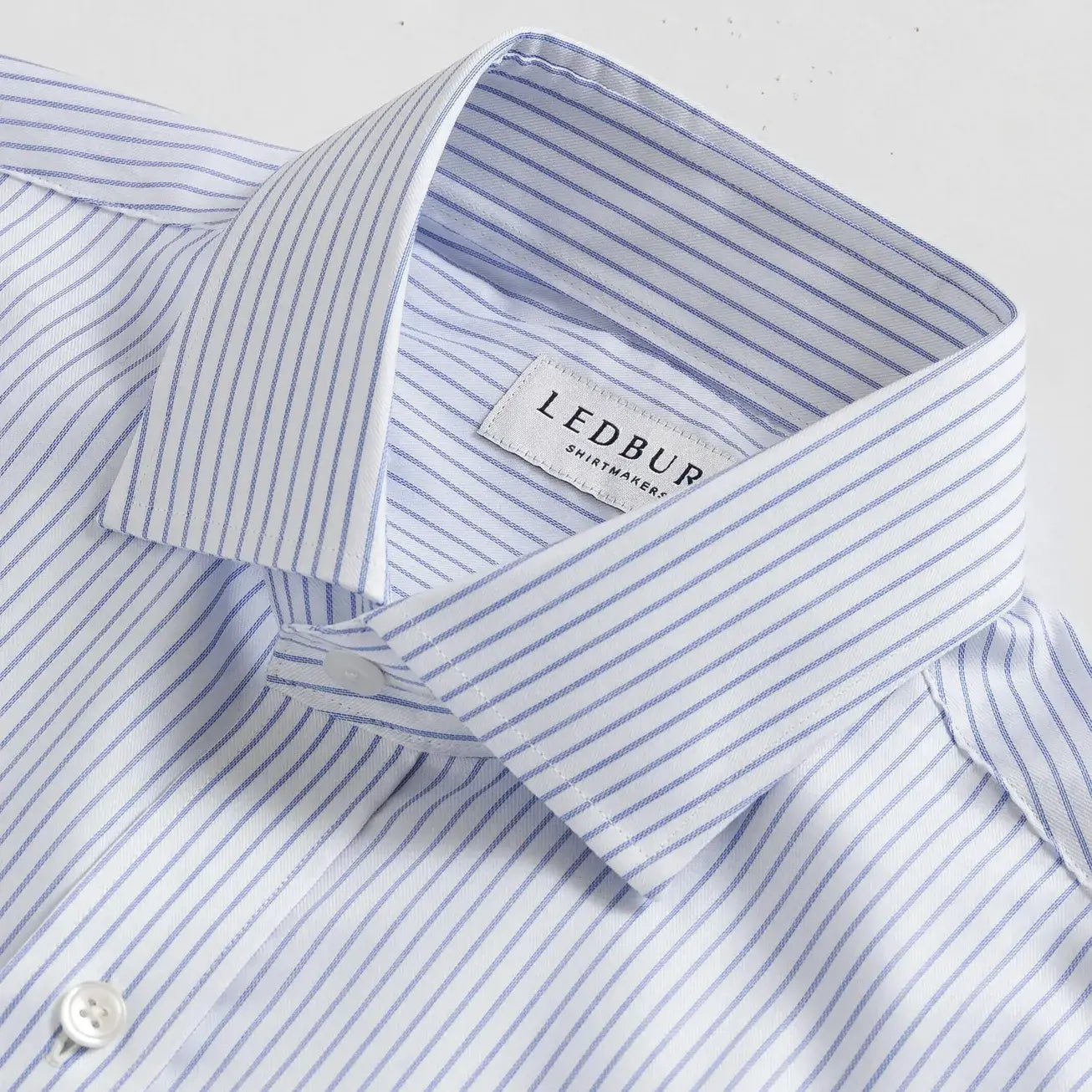 Owenby Comfort Stretch shirt collar detail - blue stripe pattern with subtle luster