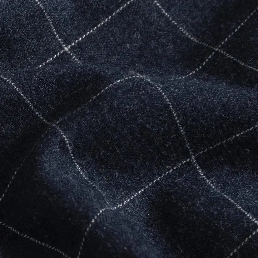 Brushed twill fabric close-up - navy windowpane check pattern texture