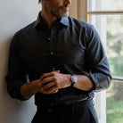 Charcoal Reda Merino shirt on a model- 100% New Zealand wool with natural stretch