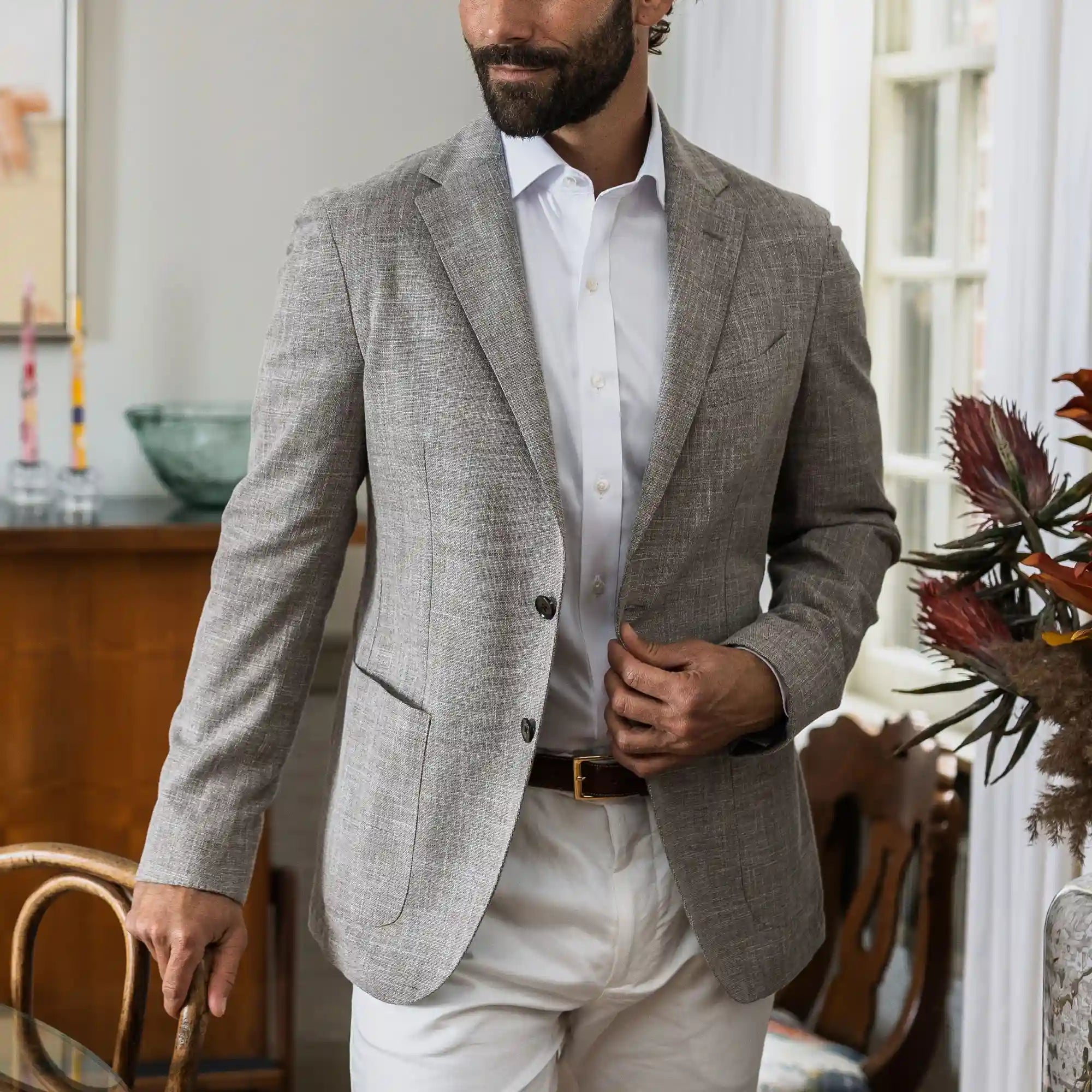 White Thompson comfort stretch twill dress shirt worn with a sport coat