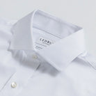 White Thompson wrinkle-resistant dress shirt collar and placket detail