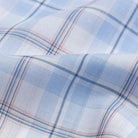 Sky blue plaid Tencel fabric close-up - 100% Tencel Alta poplin weave texture