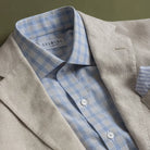 Light blue Chamlin check shirt styled with a tan sport coat - Ledbury custom dress shirt