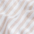 Tan Barretto stripe fabric close-up - speckled heather cotton linen texture