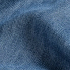Blue Easton denim fabric close-up - faded indigo Tencel texture