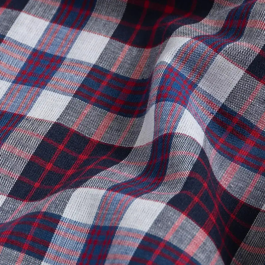 Navy blue madras plaid fabric close-up - 100% cotton Briar shirt texture