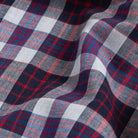 Navy blue madras plaid fabric close-up - 100% cotton Briar shirt texture