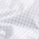 Premium blue windowpane twill fabric close-up - luxury dress shirt material
