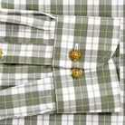 Erwood Check shirt sleeve detail - olive and brown plaid with horn khaki buttons
