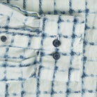 Close-up of an Italian linen check shirt with blue and white pattern