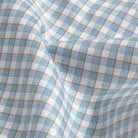 Sky blue Newhall check fabric texture - luxurious weave in light blue tones