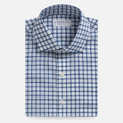 Ledbury Blue Guyer Check Custom Shirt folded flat, blue tattersall check on white cotton poplin with semi spread collar