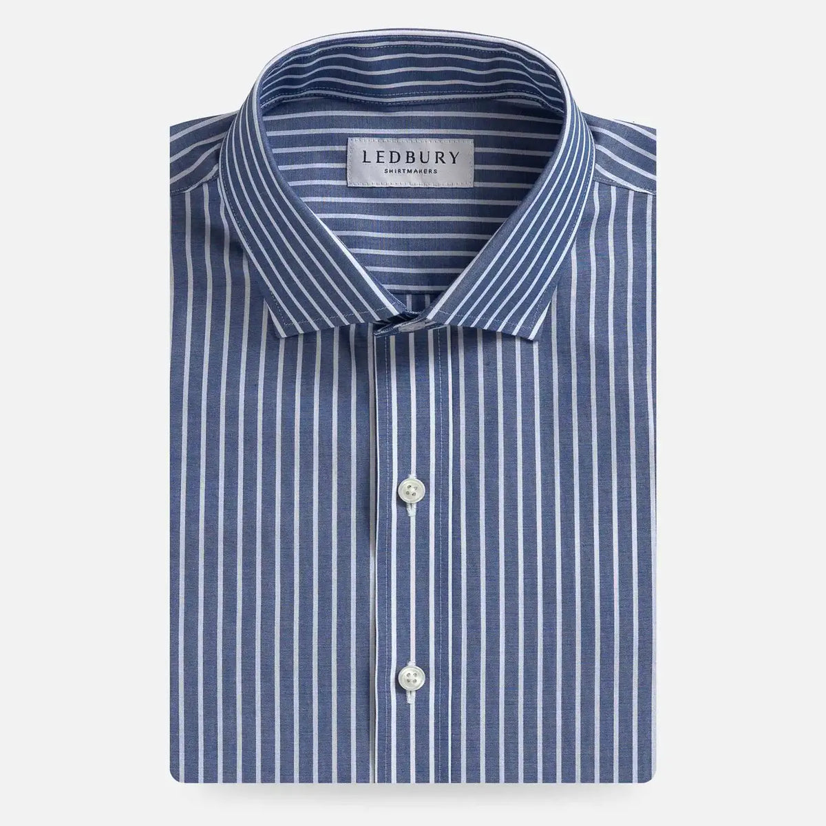 A folded Ledbury men's dress shirt with a blue and white vertical stripe pattern, shown on a clean white background.