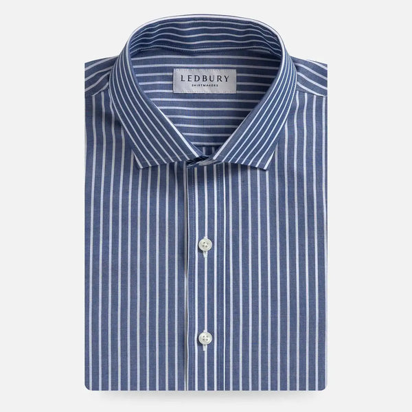 A folded Ledbury men's dress shirt with a blue and white vertical stripe pattern, shown on a clean white background.