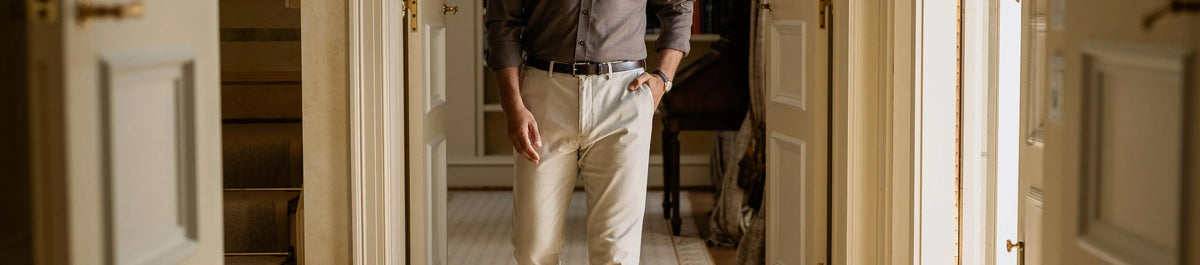 Person standing in a doorway with a blurred background