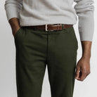 Men's forest green chino pants close-up - Richmond fit tailored style