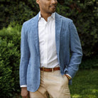 Model wearing  the brick red Singer herringbone weave dress shirt