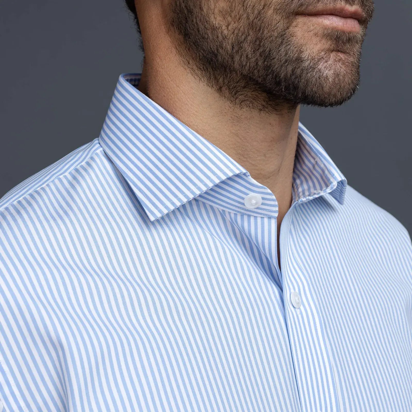 Non-iron stripe dress shirt collar on a model - wrinkle-resistant finish