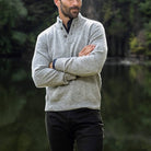Smoke Heather Brewer Mock Neck Sweater worn in lifestyle setting over a black dress shirt