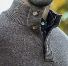 Three-button ribbed mock collar detail on the Seal Heather Brewer Mock Neck Sweater