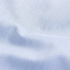 Blue dobby fabric close-up - Italian-woven diamond texture