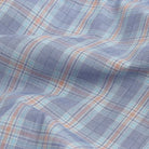Blue Khal Check fabric close-up - alternating poplin weave showing rich blue check pattern