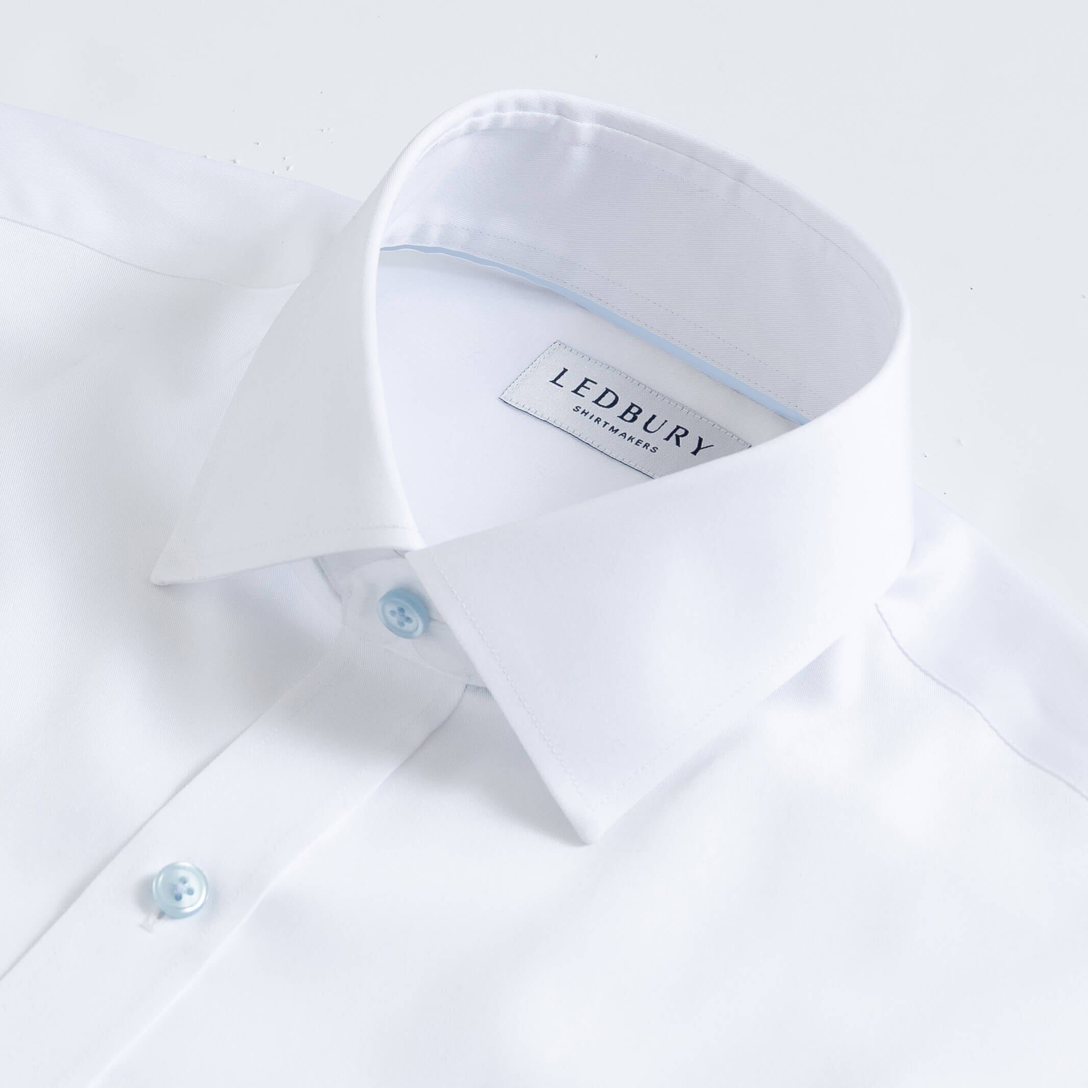White dress shirt collar with light blue button detail - fine twill custom shirt
