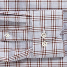 Rustic brown Arnett plaid sleeve detail - double button barrel cuff