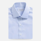 Light blue non-iron dress shirt flat lay - wrinkle-free custom fit shirt