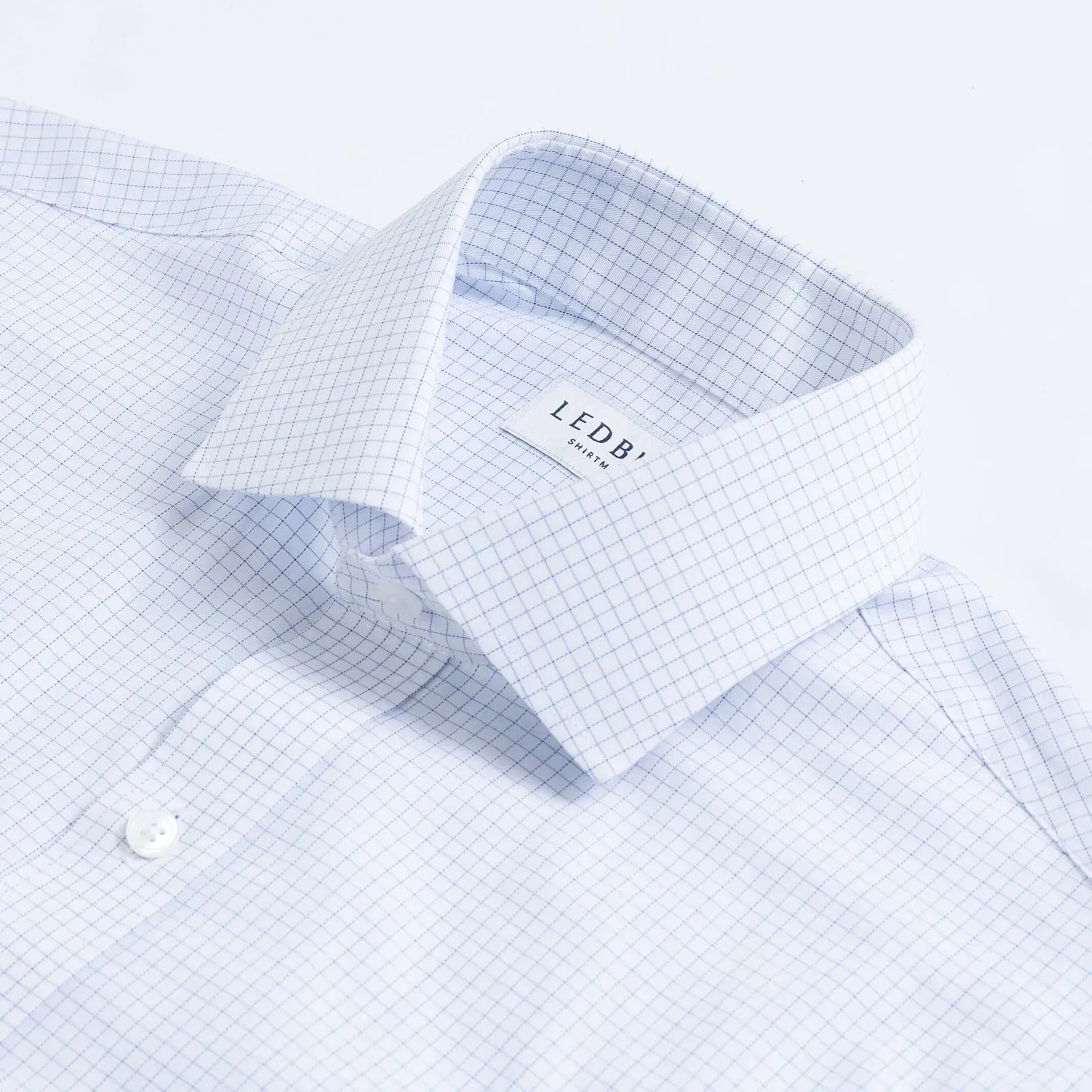 Navy check dress shirt collar construction detail